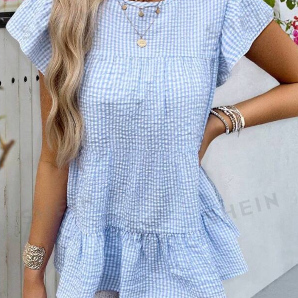 Baby blue top.